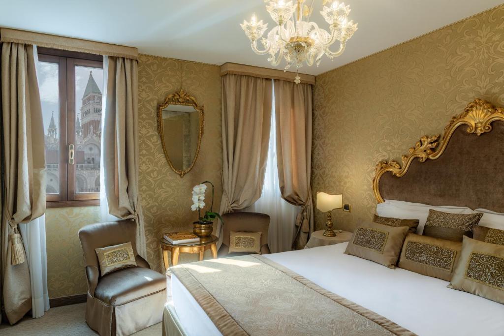 Postel nebo postele na pokoji v ubytování Hotel Concordia