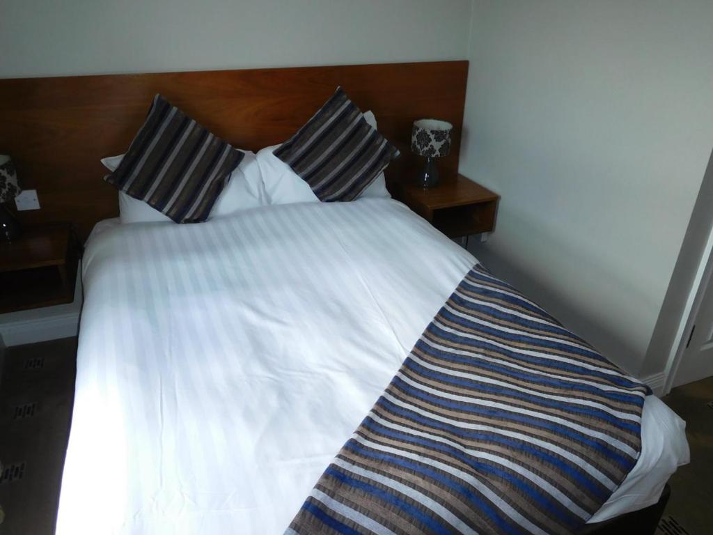Postel nebo postele na pokoji v ubytování Anam Cara B&B