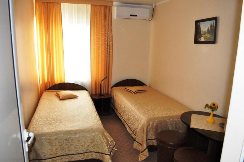 Postel nebo postele na pokoji v ubytování Hotel Andrei