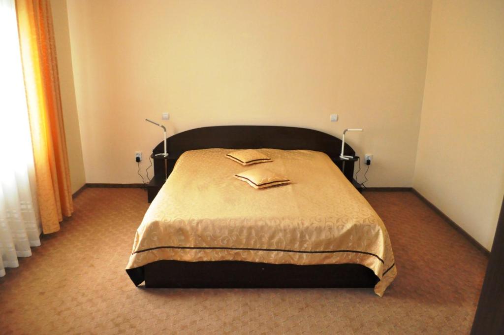 Postel nebo postele na pokoji v ubytování Hotel Andrei