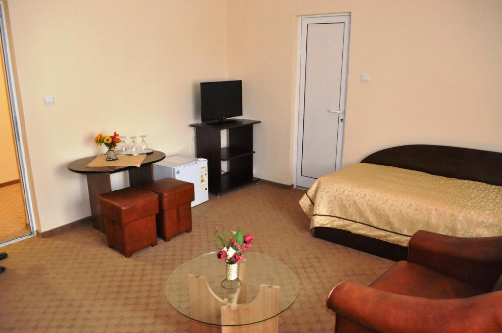 Postel nebo postele na pokoji v ubytování Hotel Andrei
