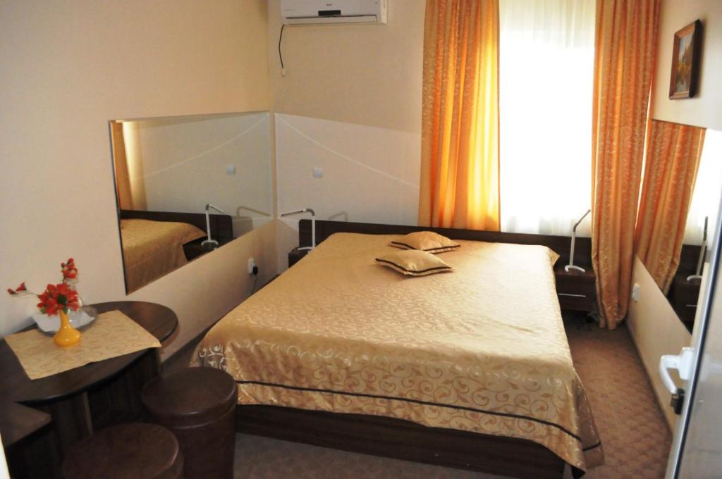 Postel nebo postele na pokoji v ubytování Hotel Andrei