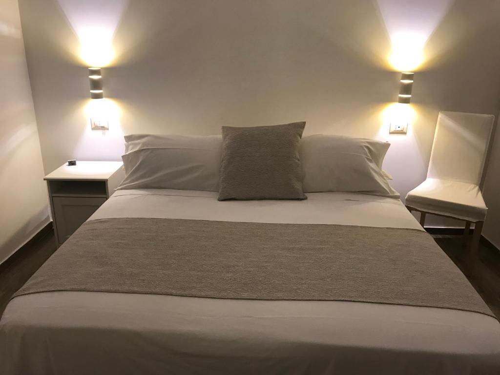 Postel nebo postele na pokoji v ubytování Hotel Cambogia