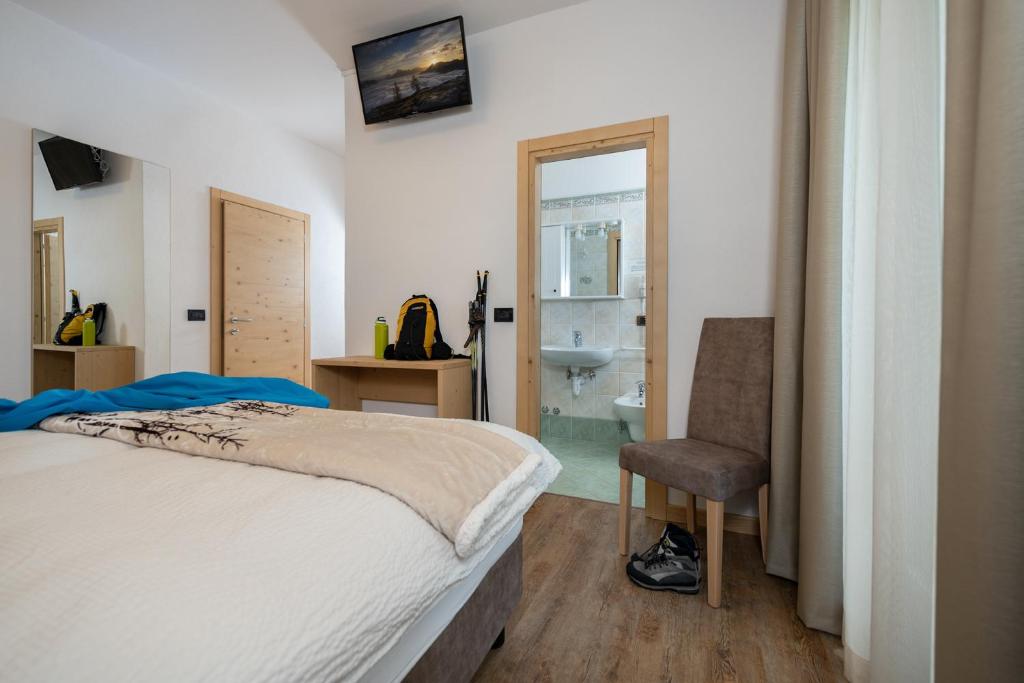 Postel nebo postele na pokoji v ubytování GARNI' Margherita