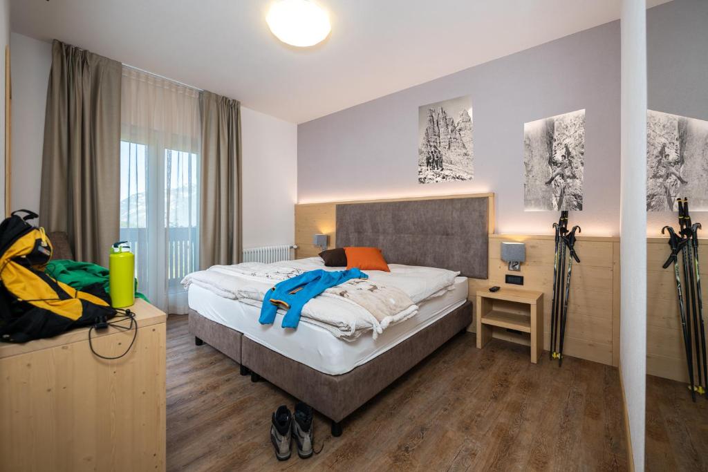 Postel nebo postele na pokoji v ubytování GARNI' Margherita