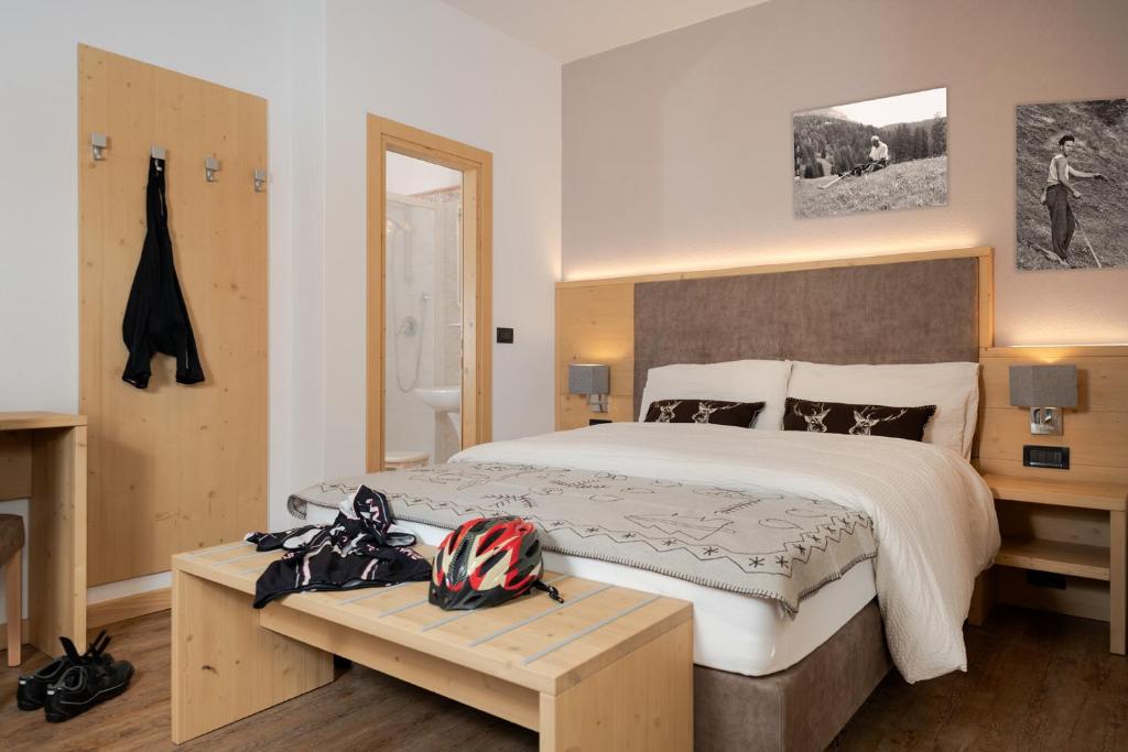 Postel nebo postele na pokoji v ubytování GARNI' Margherita
