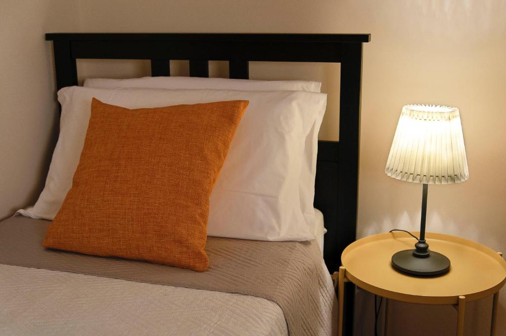 Posteľ alebo postele v izbe v ubytovaní Xenía B&B