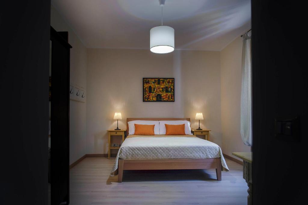 Posteľ alebo postele v izbe v ubytovaní Xenía B&B