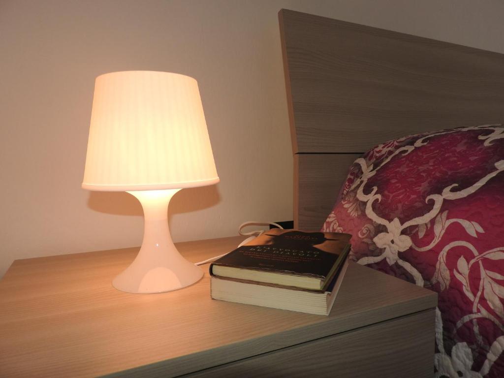 A bed or beds in a room at Casa Principe Umberto