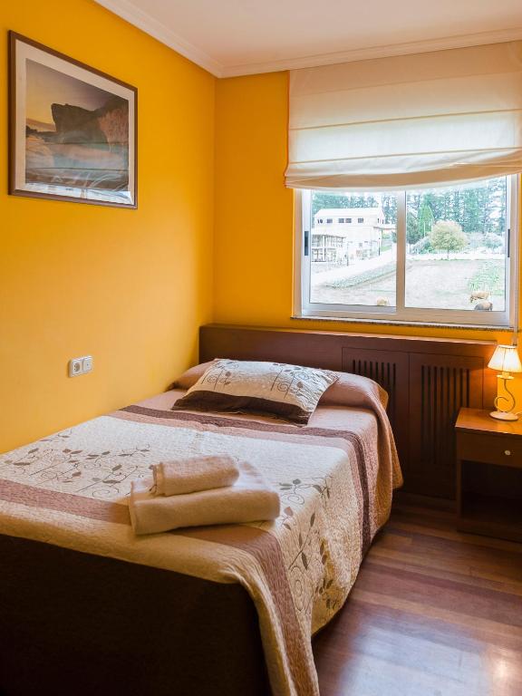Postel nebo postele na pokoji v ubytování Pension ARCA