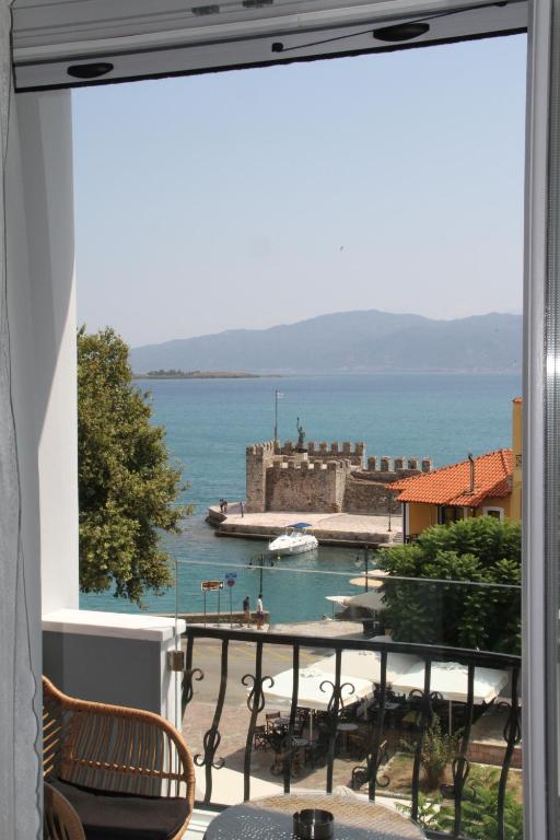 a view of the ocean from a balcony at Amaryllis in Nafpaktos