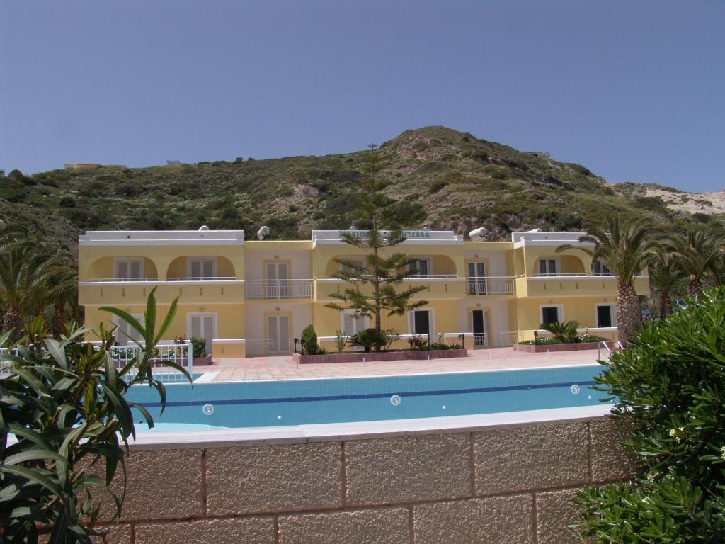 a view of the hotel from the pool at Kontessa Apartments in Kefalos