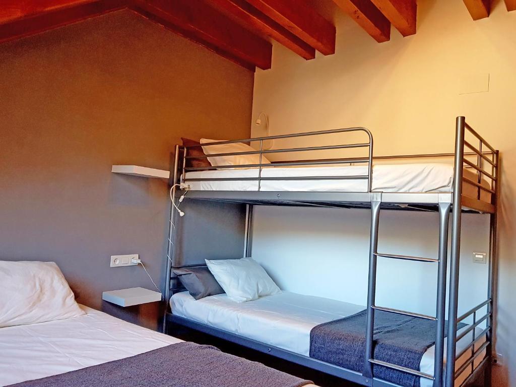 Posteľ alebo postele v izbe v ubytovaní Apartamento dúplex Esterri d'Aneu