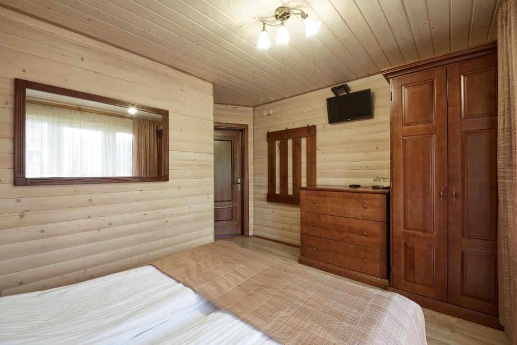 Postel nebo postele na pokoji v ubytování Zlata