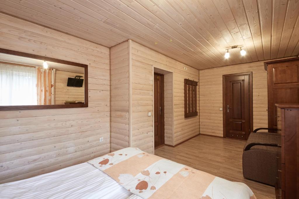 Postel nebo postele na pokoji v ubytování Zlata
