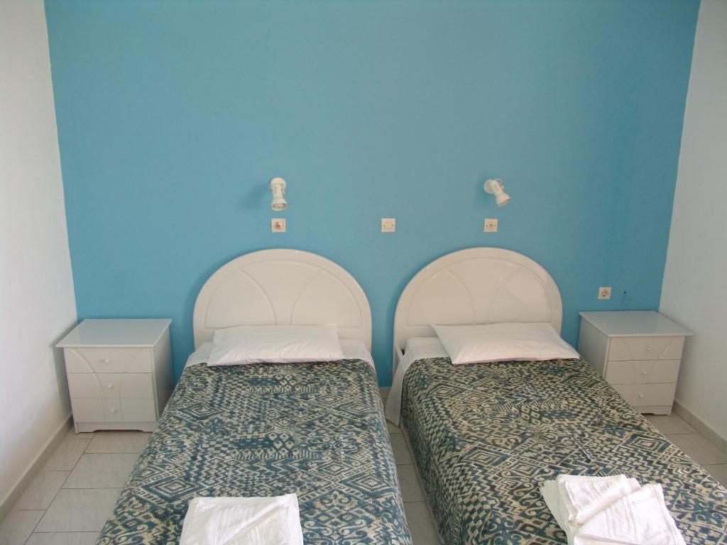 Postel nebo postele na pokoji v ubytování Kontessa Apartments