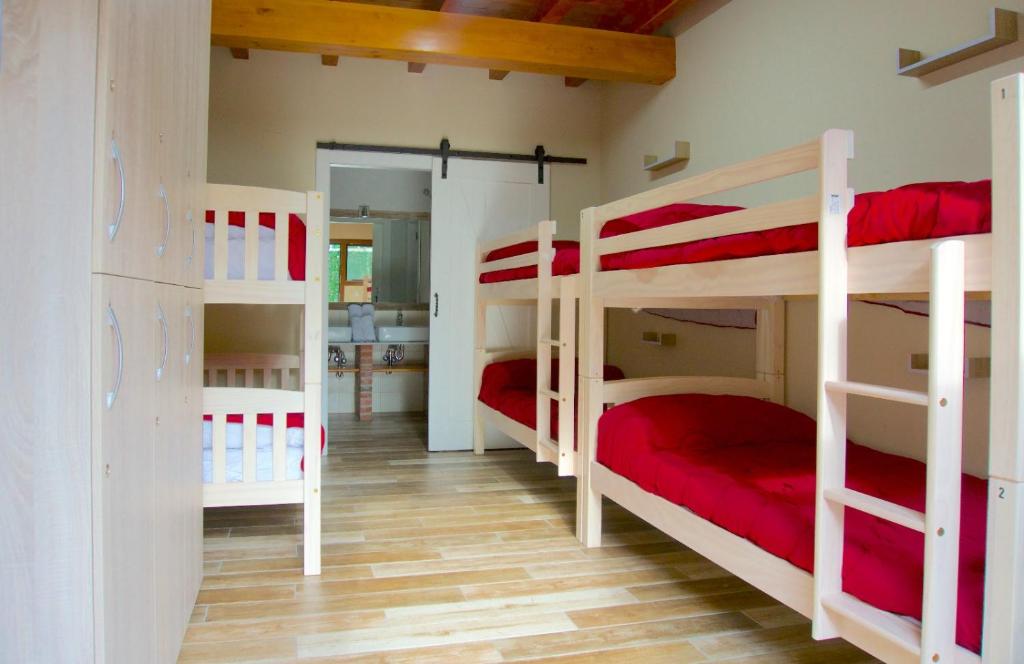 Postel nebo postele na pokoji v ubytování La Cala Hostel