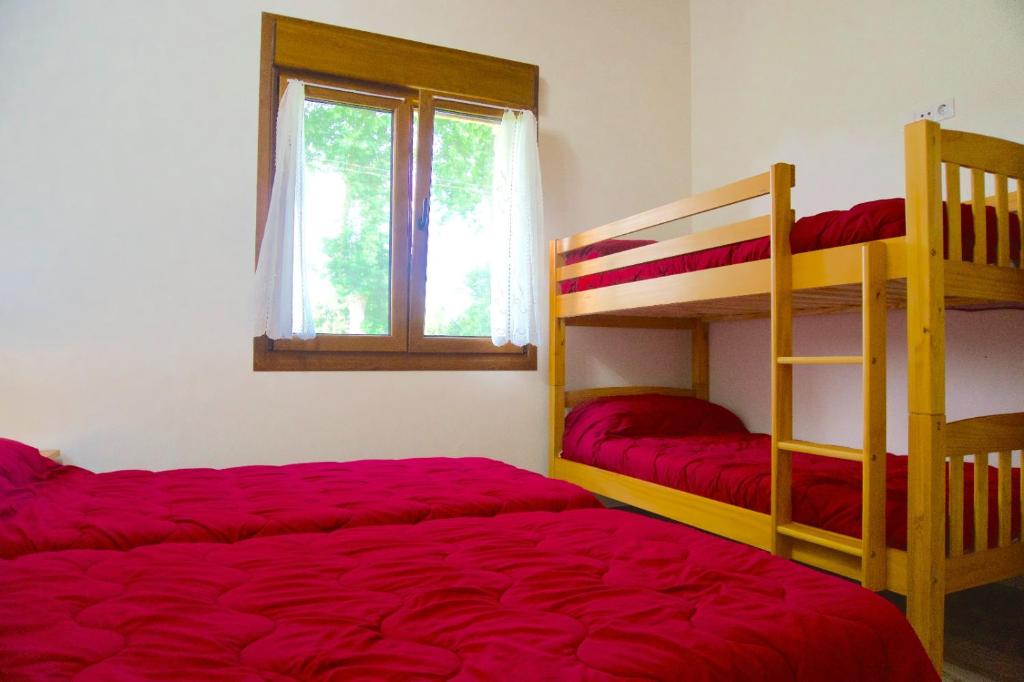 Postel nebo postele na pokoji v ubytování La Cala Hostel