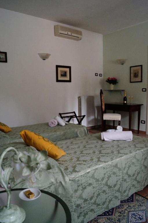 Postel nebo postele na pokoji v ubytování Bed And Breakfast Il Garoch