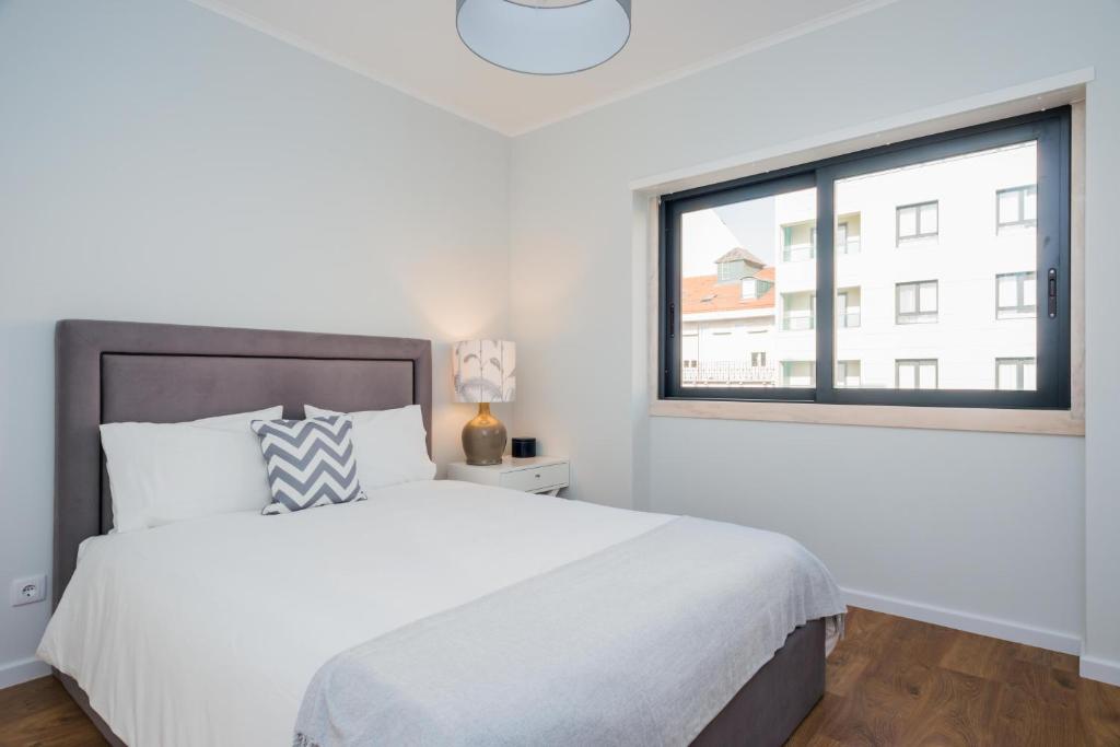 Postel nebo postele na pokoji v ubytování 137 LuxResidence