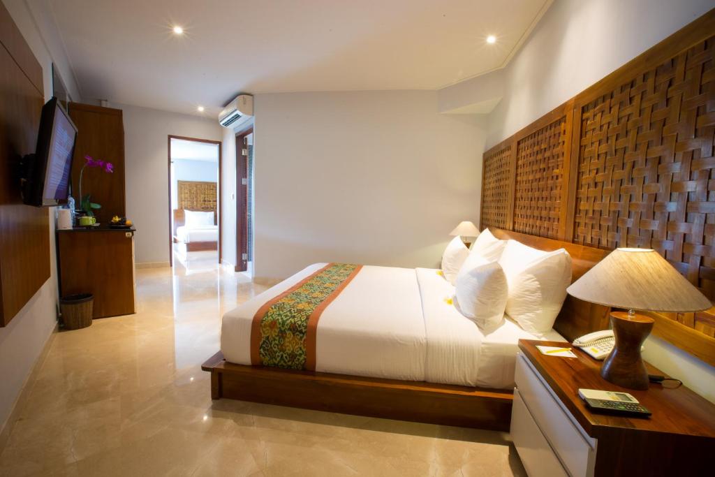 Postel nebo postele na pokoji v ubytování Ubud Wana Resort
