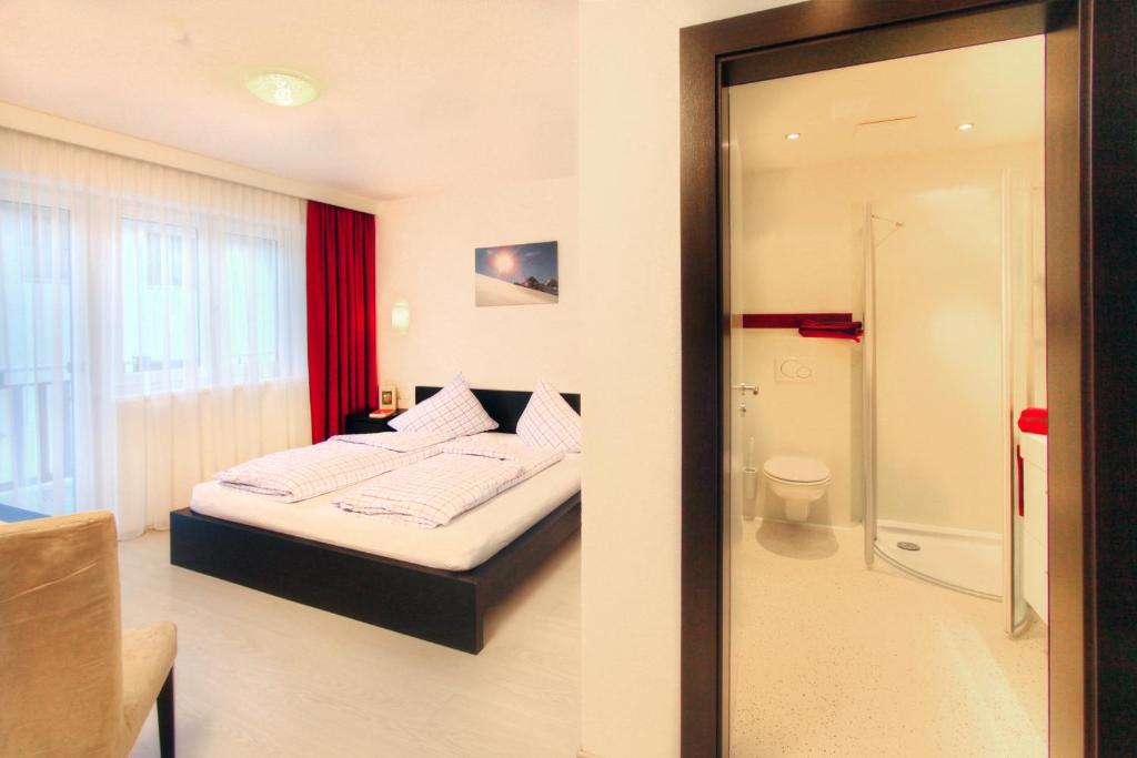 Postel nebo postele na pokoji v ubytování Haus Pia by A CASA