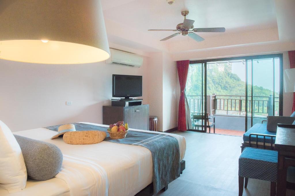 Postel nebo postele na pokoji v ubytování Krabi Chada Resort - SHA Plus