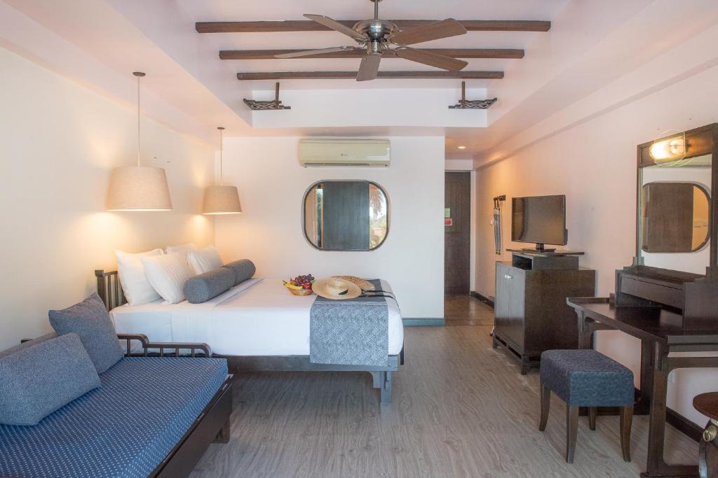 Postel nebo postele na pokoji v ubytování Krabi Chada Resort - SHA Plus