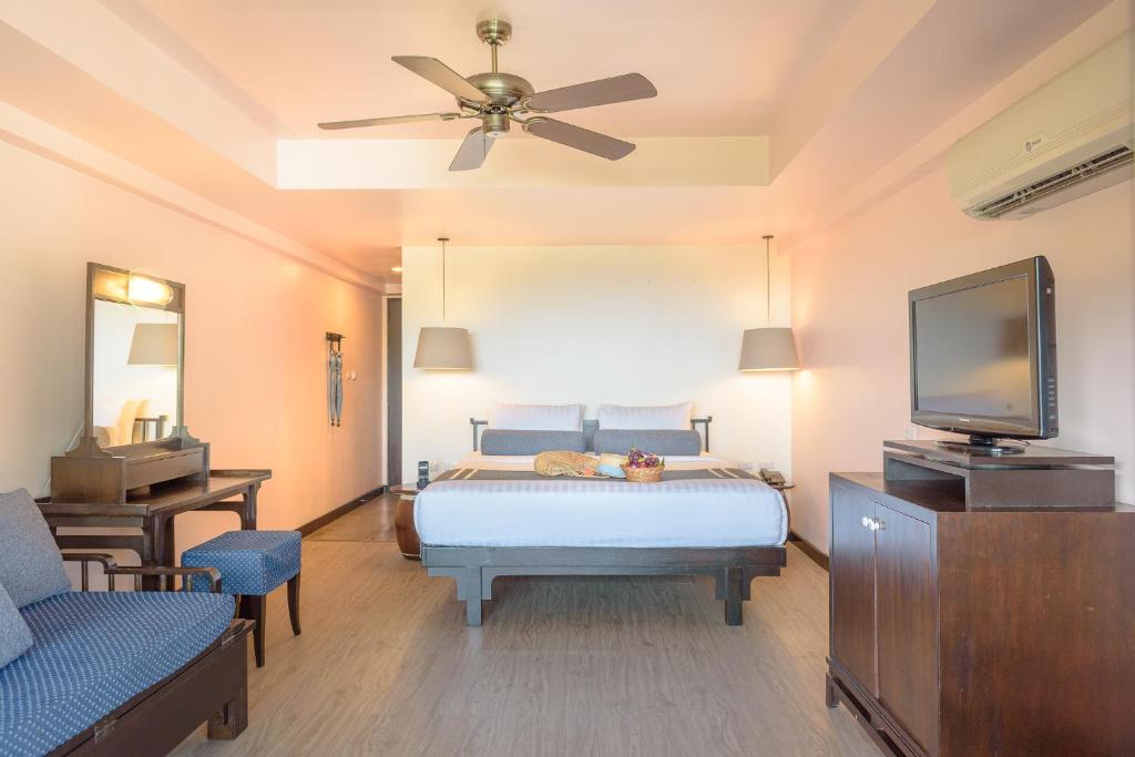 Postel nebo postele na pokoji v ubytování Krabi Chada Resort - SHA Plus