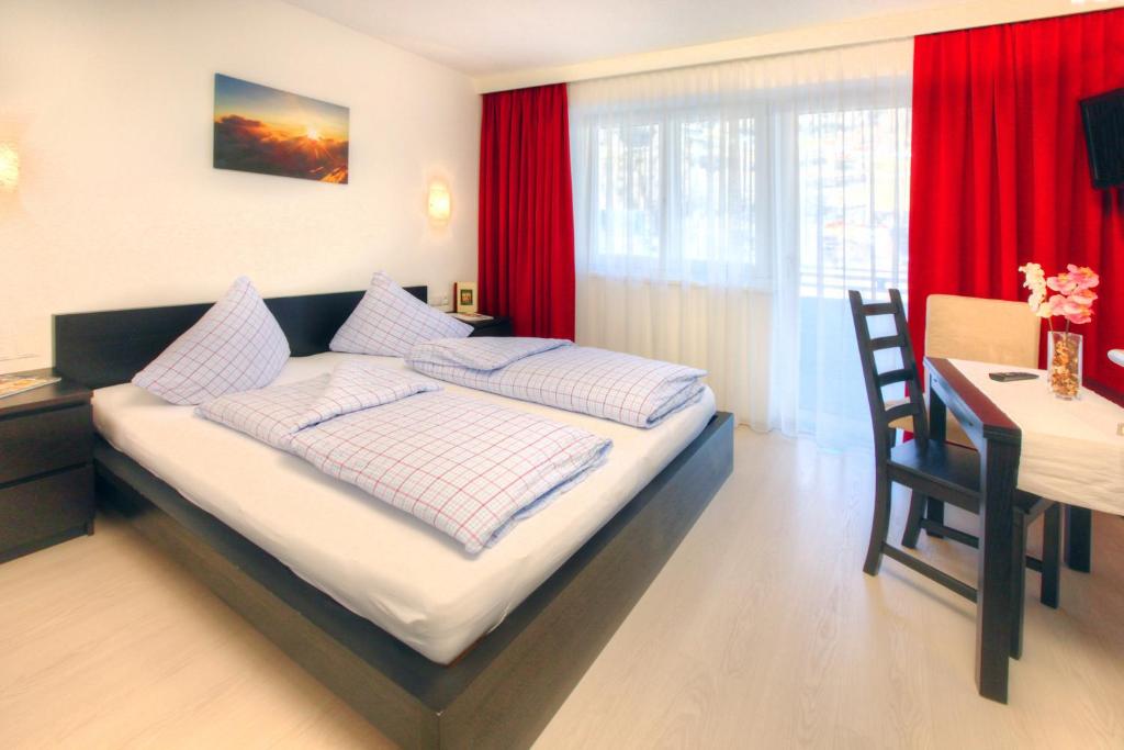 Postel nebo postele na pokoji v ubytování Haus Pia by A CASA