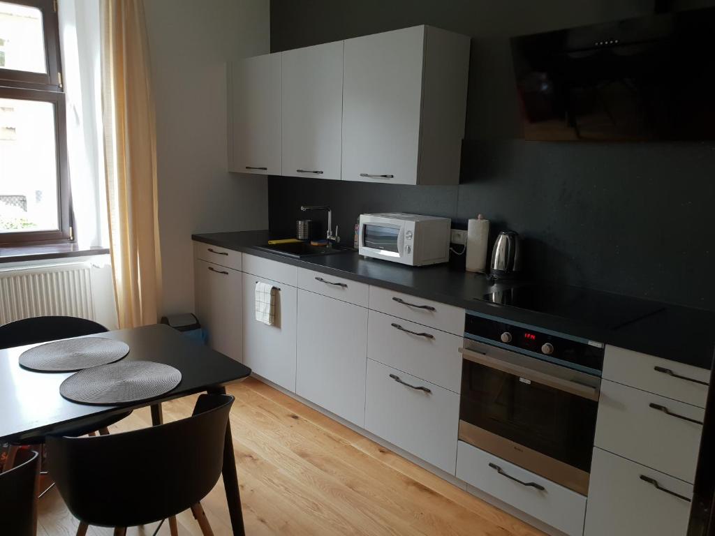 Η κουζίνα ή μικρή κουζίνα στο The Gusto apartmán