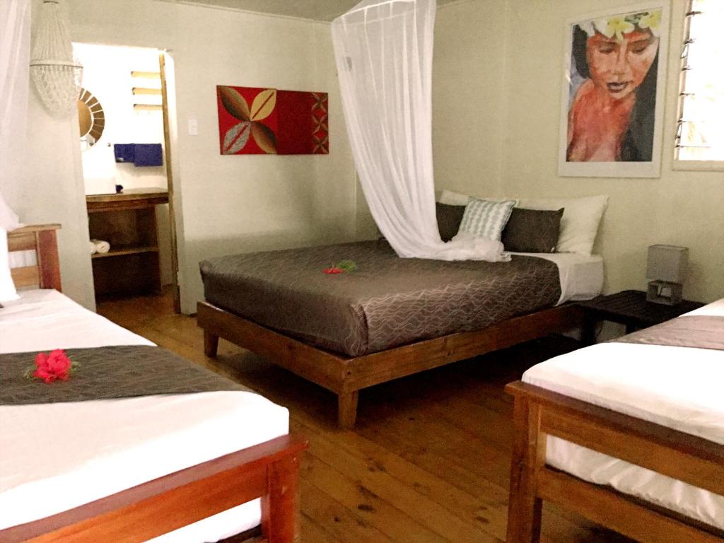 Postel nebo postele na pokoji v ubytování Maqai Beach Eco Resort