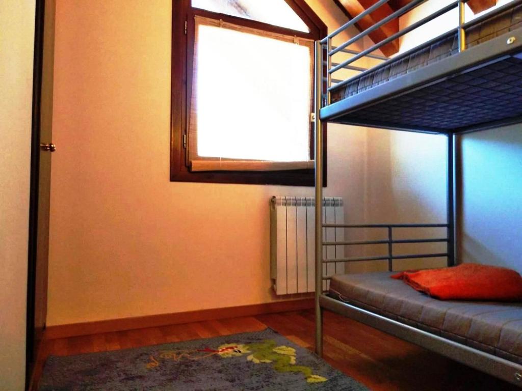Postel nebo postele na pokoji v ubytování Dúplex familiar en Esterri d'Àneu