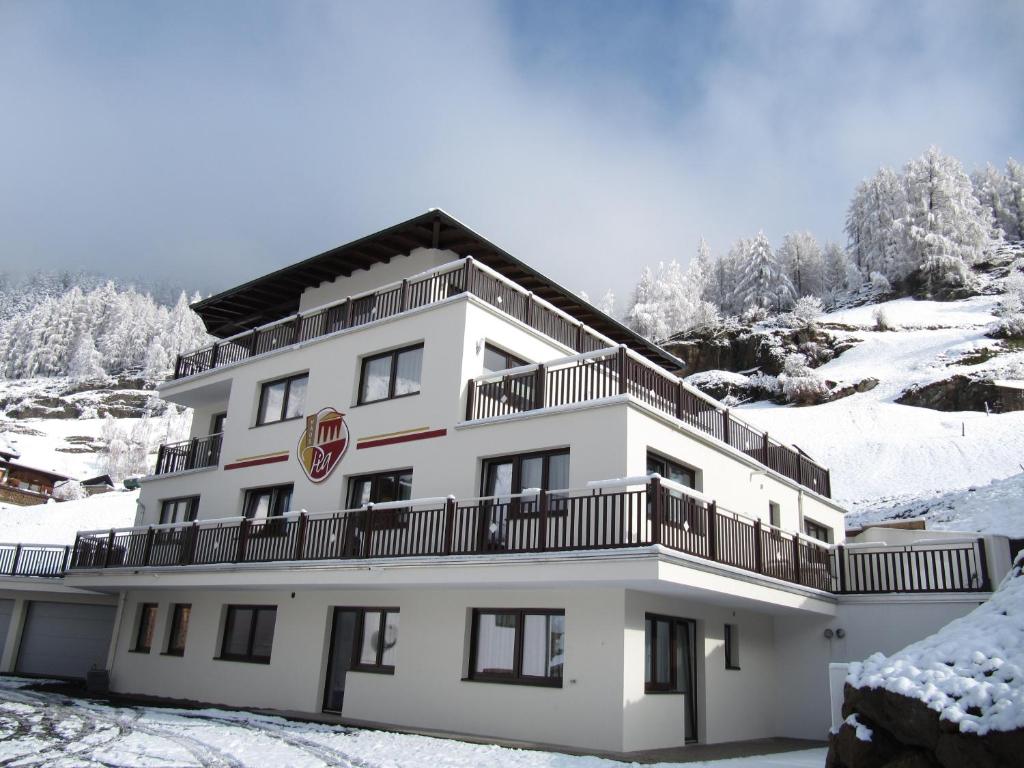 Haus Pia by A CASA v zimě
