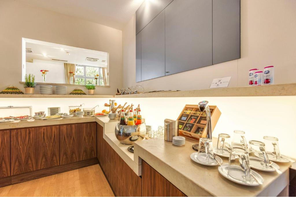 Kuchyň nebo kuchyňský kout v ubytování Hotel Hiemann - Superior