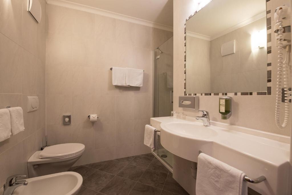 Koupelna v ubytování Garni Hotel Bel Vert