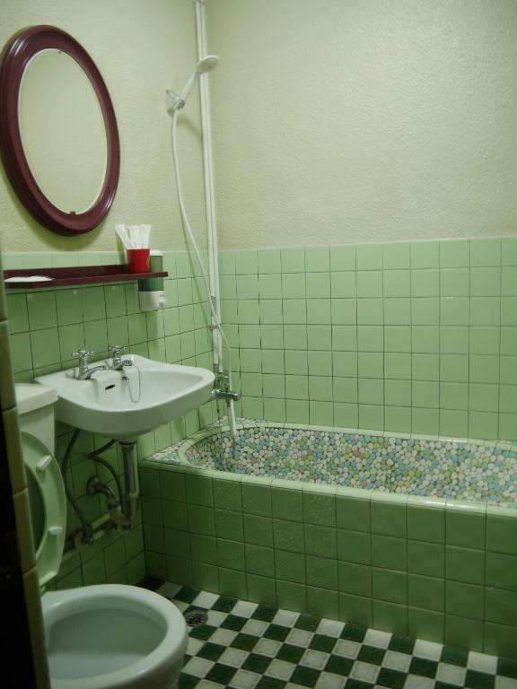Koupelna v ubytování Ku Shan Yuan Hotel
