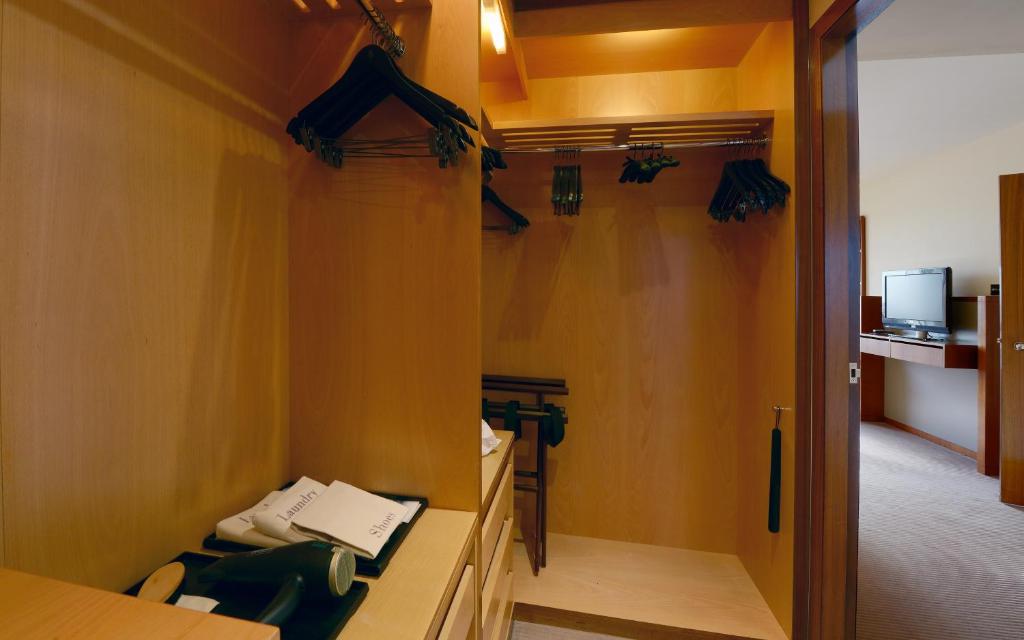 Cama ou camas em um quarto em Canary Riverside Plaza Hotel