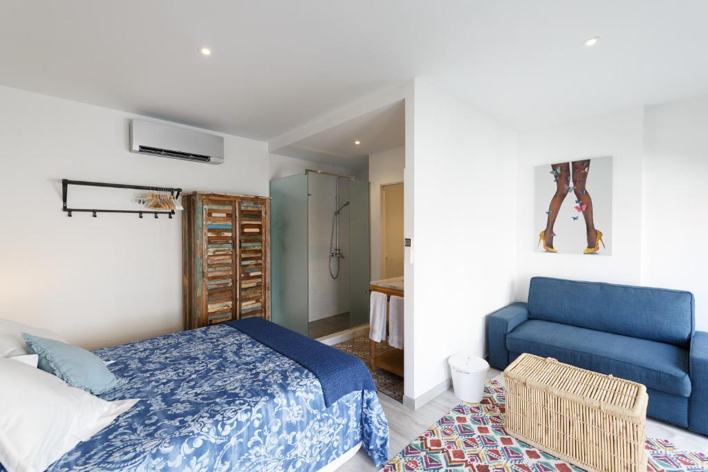 Ein Bett oder Betten in einem Zimmer der Unterkunft Marbella Old Town House