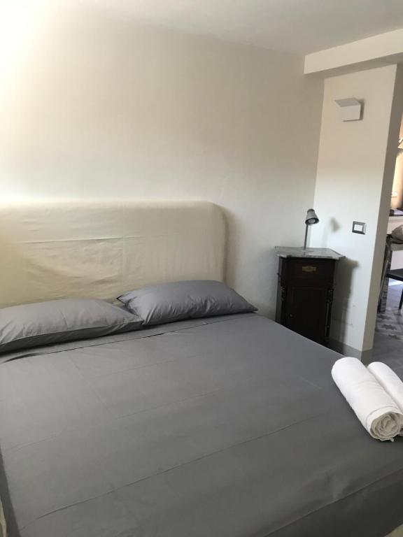 Posteľ alebo postele v izbe v ubytovaní Saraceni 20