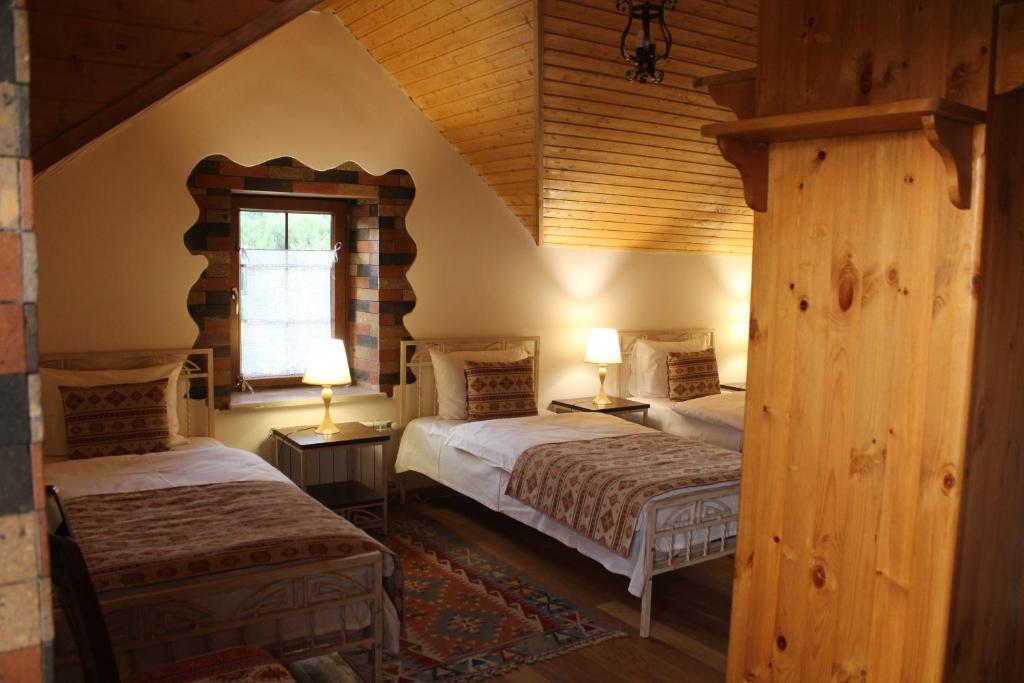 Postel nebo postele na pokoji v ubytování Garni HinYard