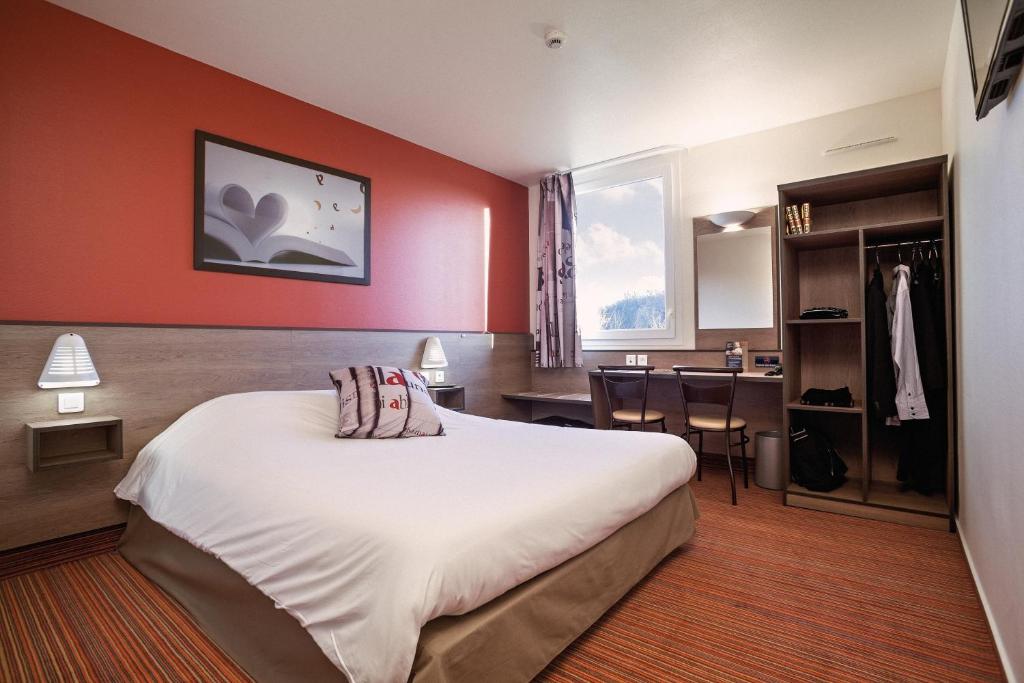 Säng eller sängar i ett rum på Ace Hotel Bourges