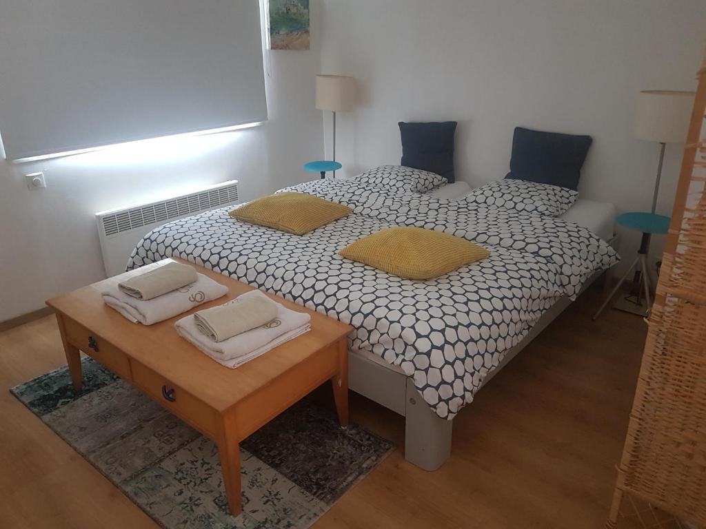 Postel nebo postele na pokoji v ubytování Art-hill