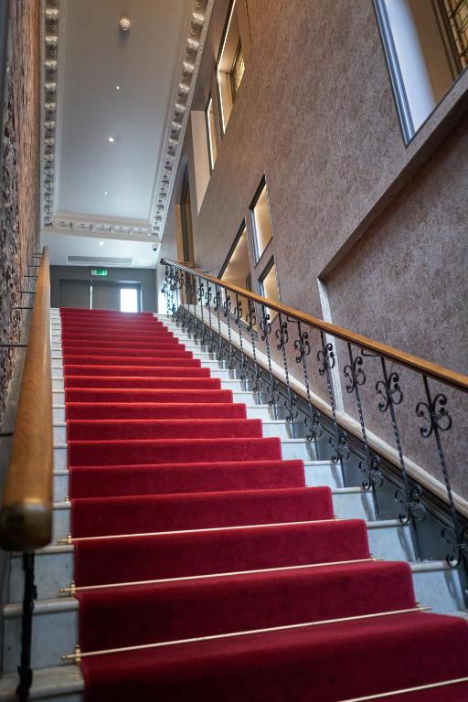 a red carpeted staircase in a building at Avon Gorge by Hotel du Vin in Bristol