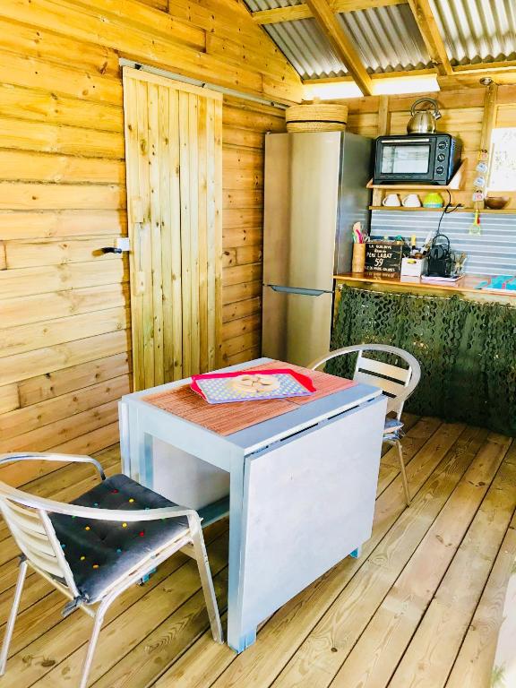 Kuchyň nebo kuchyňský kout v ubytování Bungalow de charme vue mer