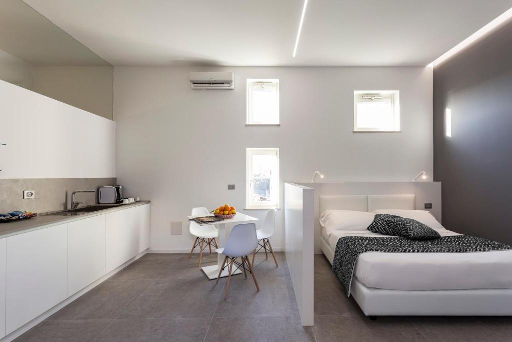 Kuchyň nebo kuchyňský kout v ubytování Nostos rooms & Apartments