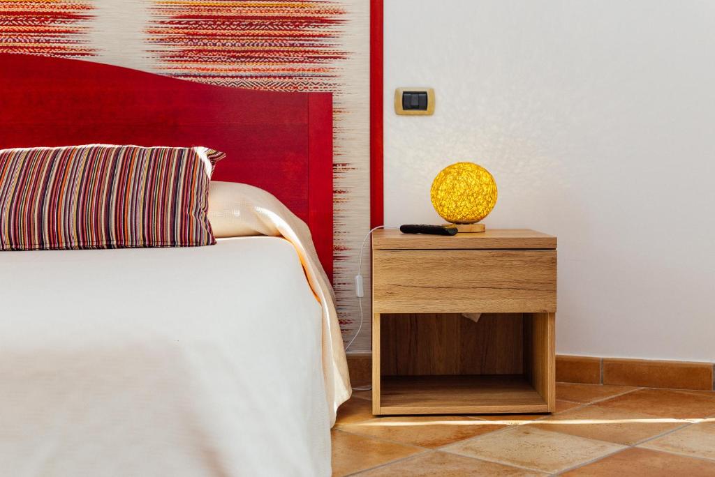 Postel nebo postele na pokoji v ubytování Vista Mare B&B