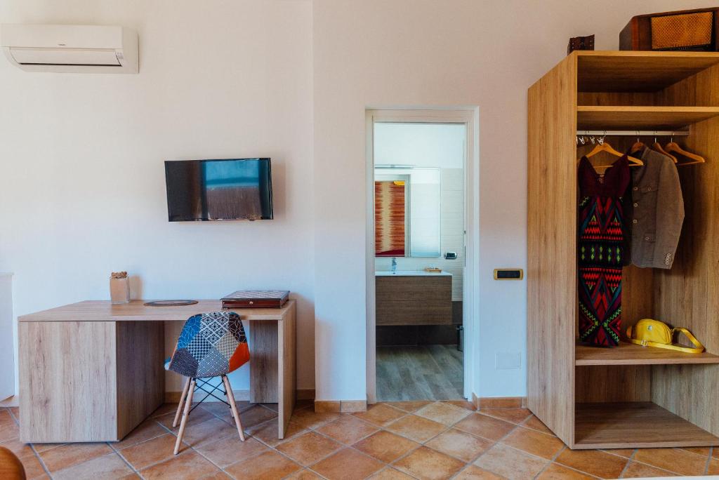 TV a/nebo společenská místnost v ubytování Vista Mare B&B