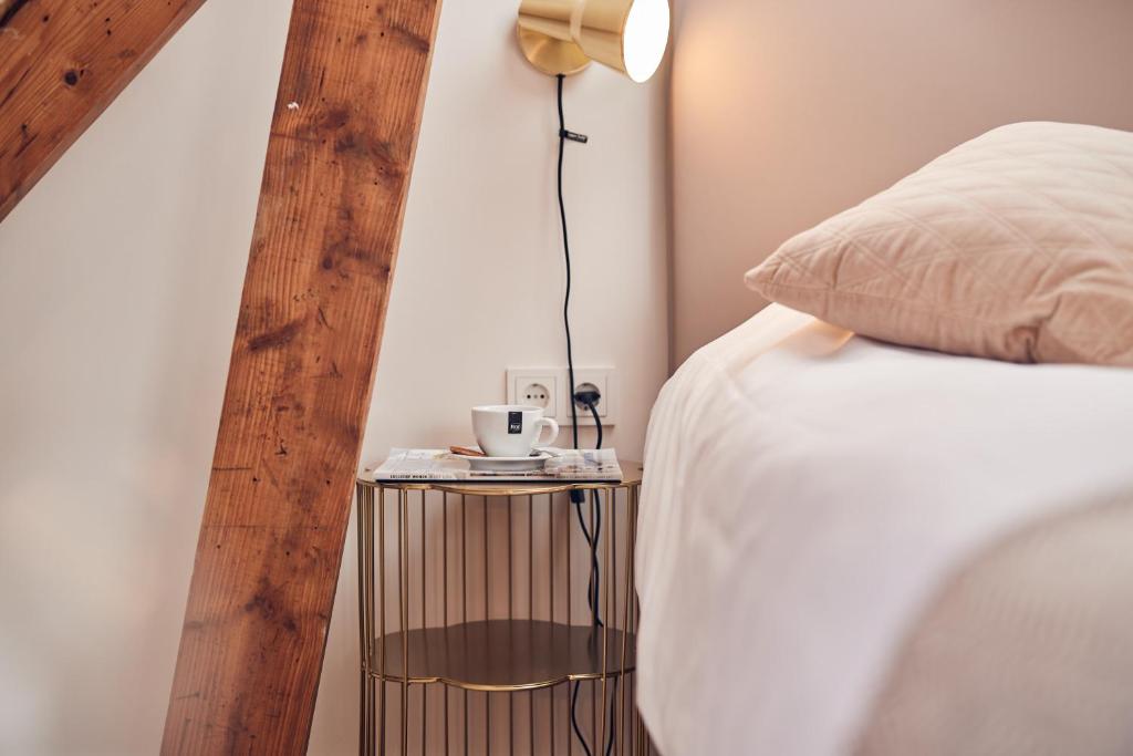 Postel nebo postele na pokoji v ubytování Boutique Hotel Bellevue