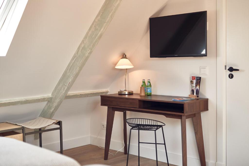 TV a/nebo společenská místnost v ubytování Boutique Hotel Bellevue
